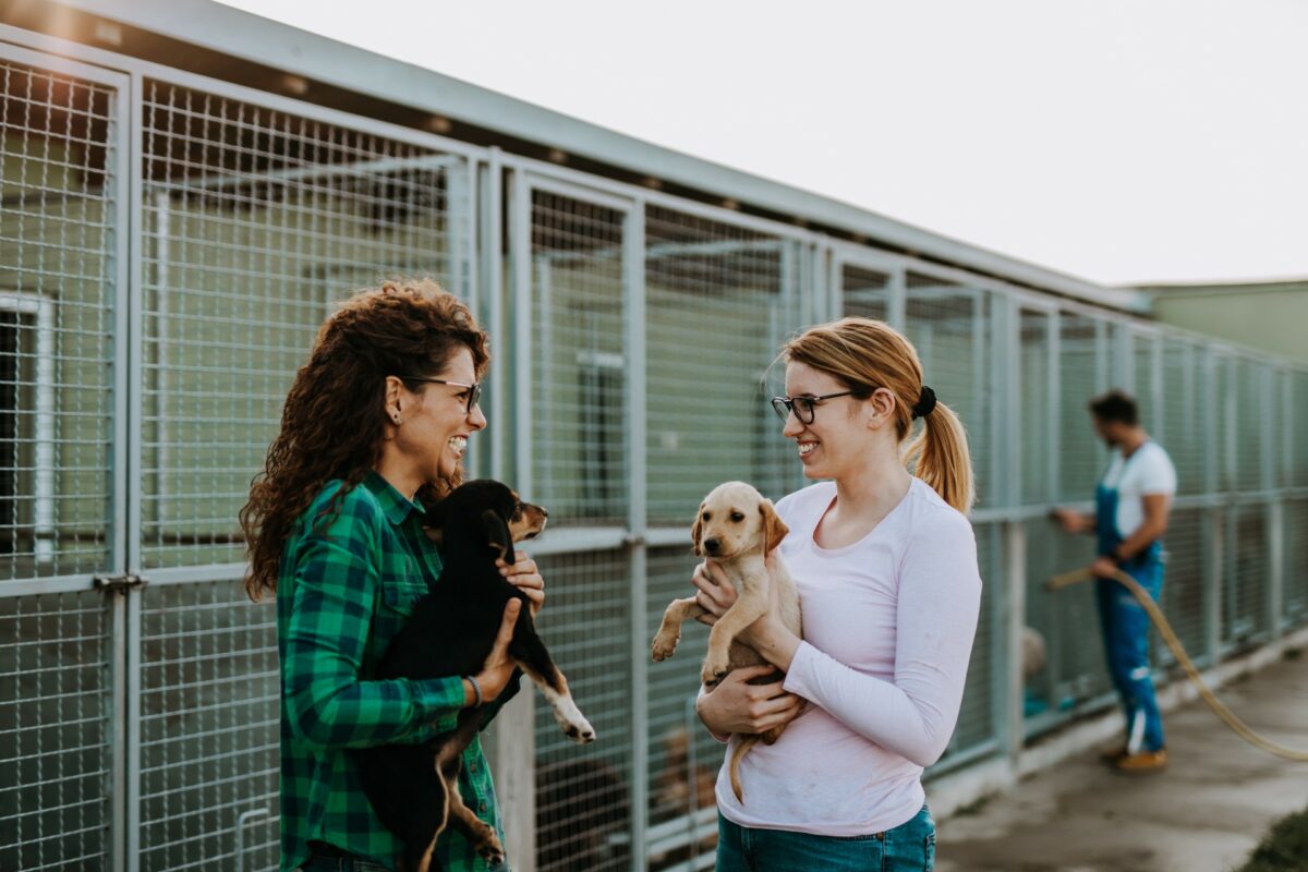 women both holding